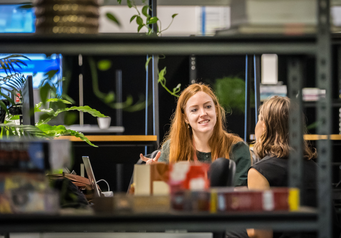 Woman talking to another woman
