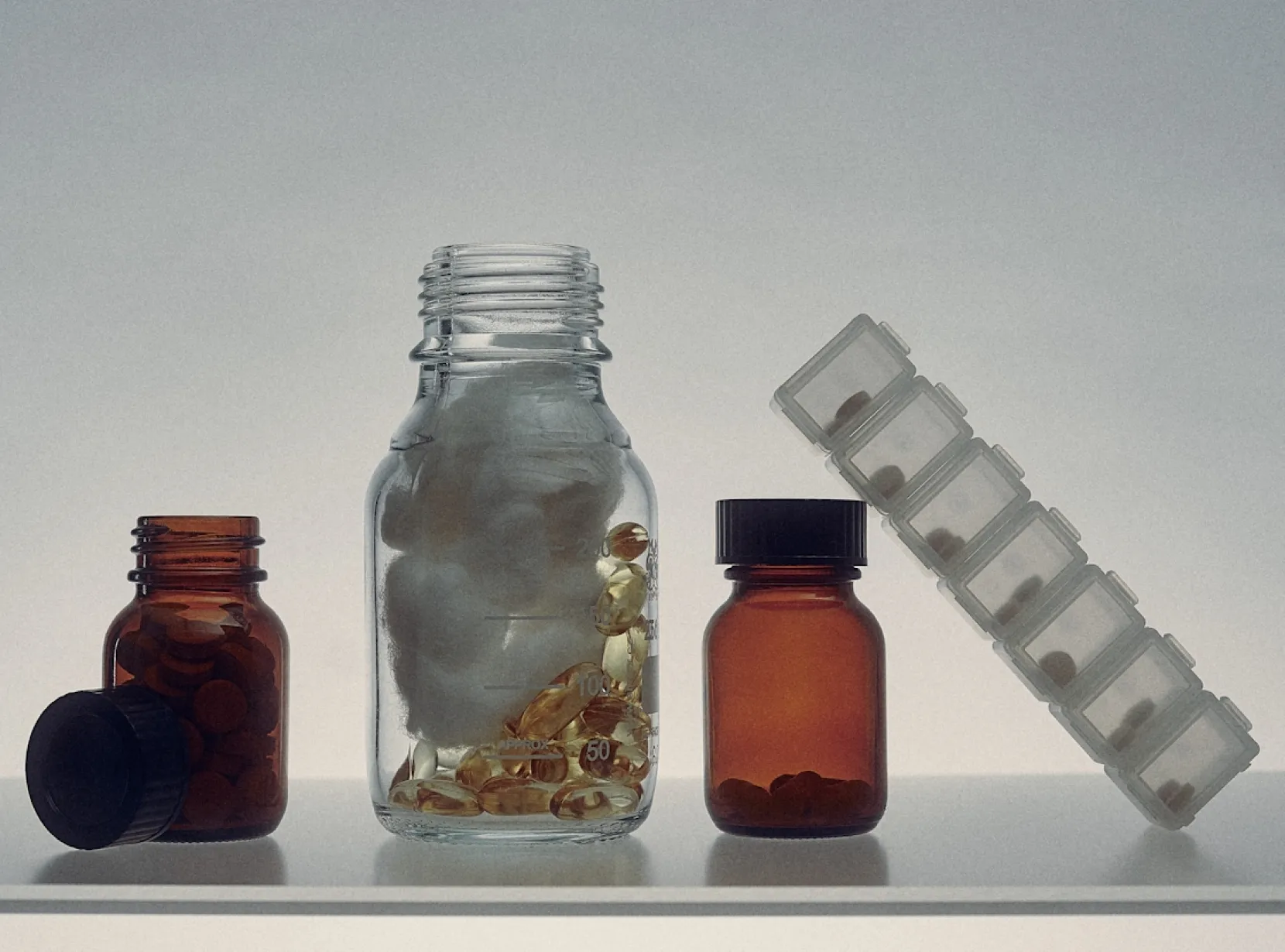 Image of lots of pills lined up in a row