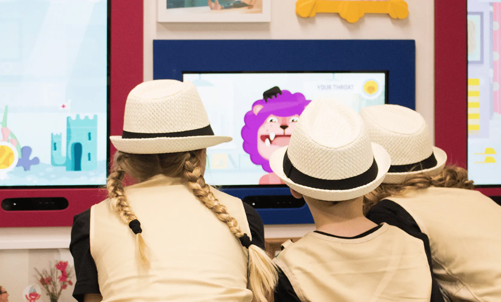 Children looking at the Starship animal wall