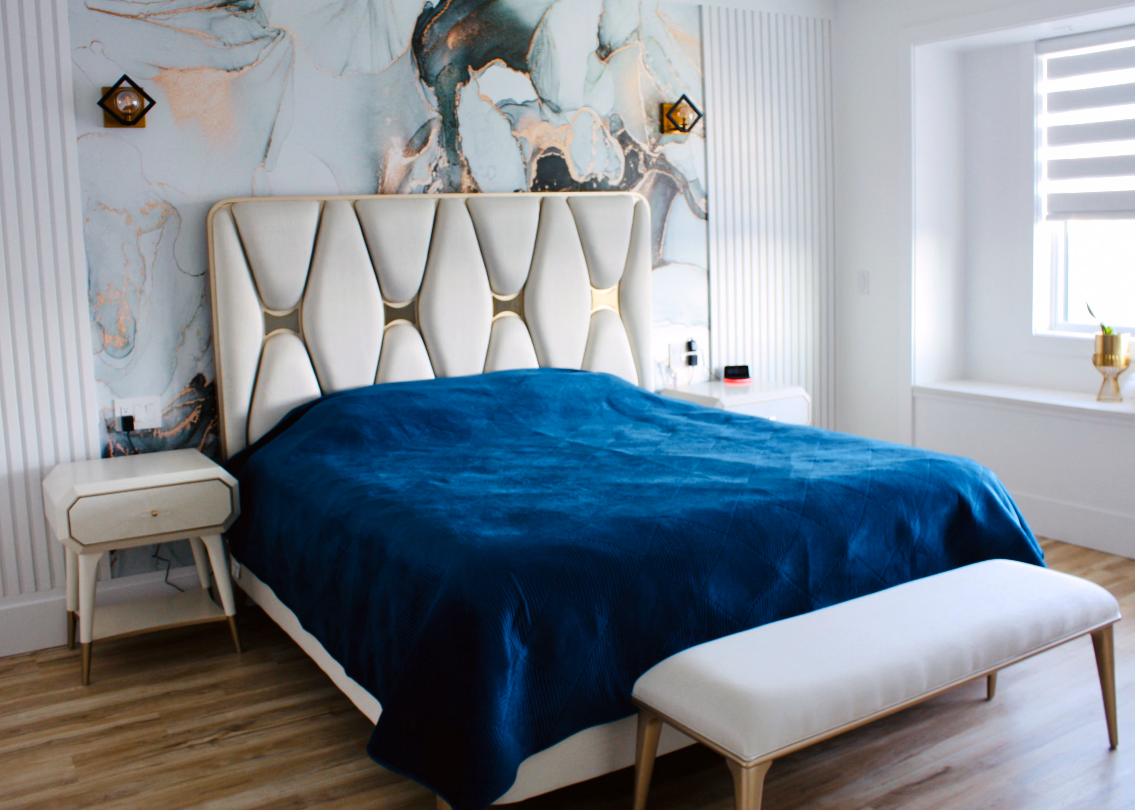 Master bedroom with beautifully painting interior, and graceful attention to detail.