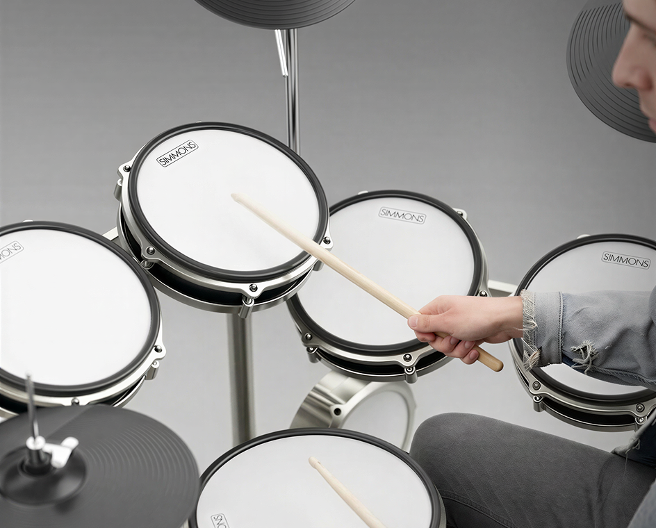 A view of the toms of the Simmons Titan 50 drum kit set while a drummer is playing music