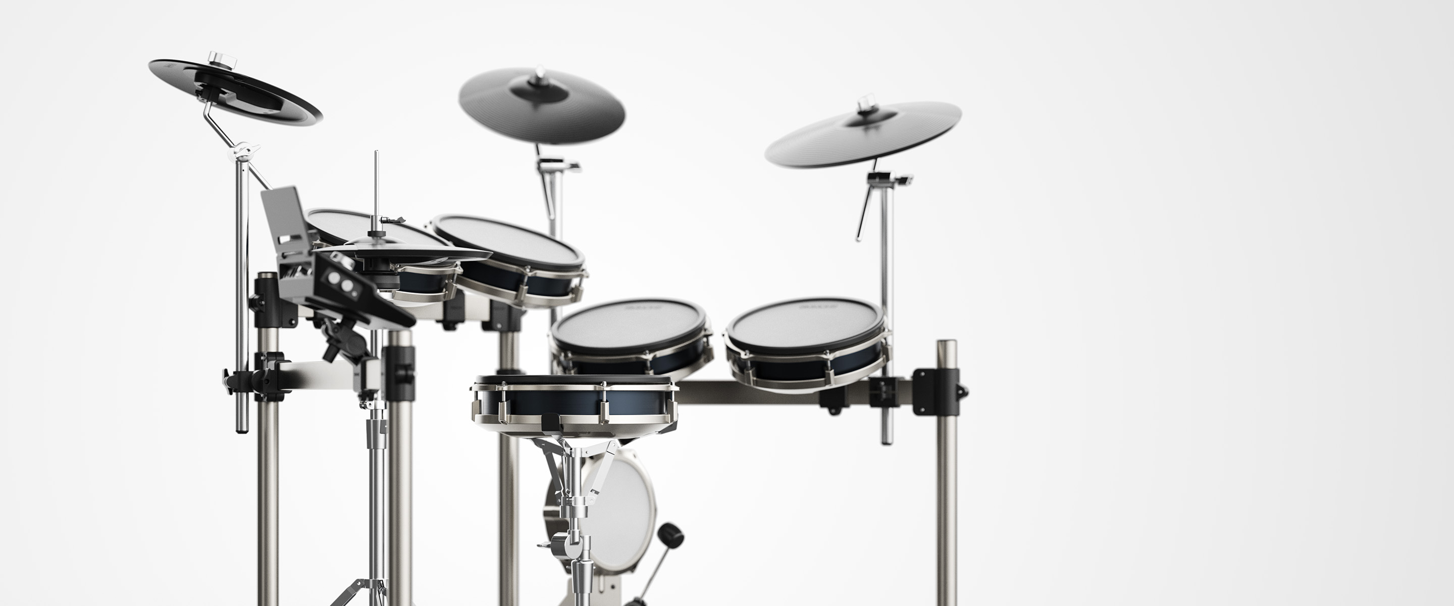 A view of the toms of the Simmons Titan 50 drum kit set while a drummer is playing music