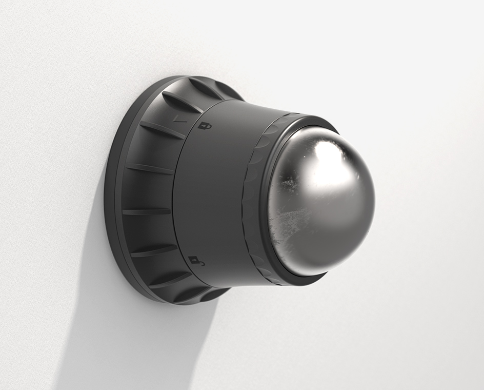 The Sharper Image Ice Therapy Massage Ball mounted on a white wall. The metal ball is snapped into a plastic housing.