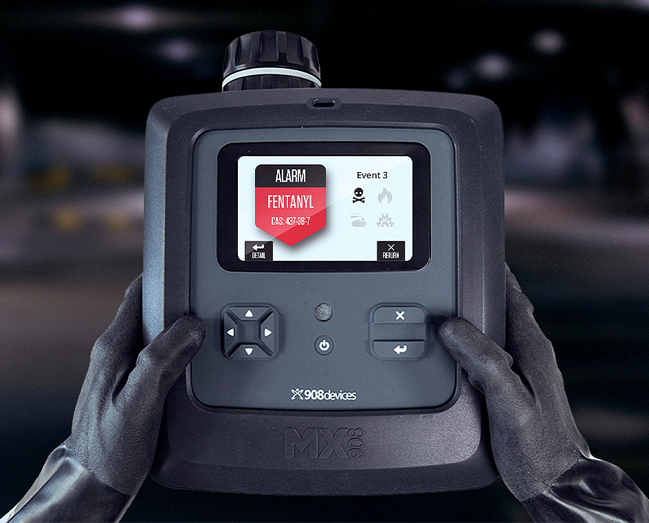 A user operating the MX908 in the field