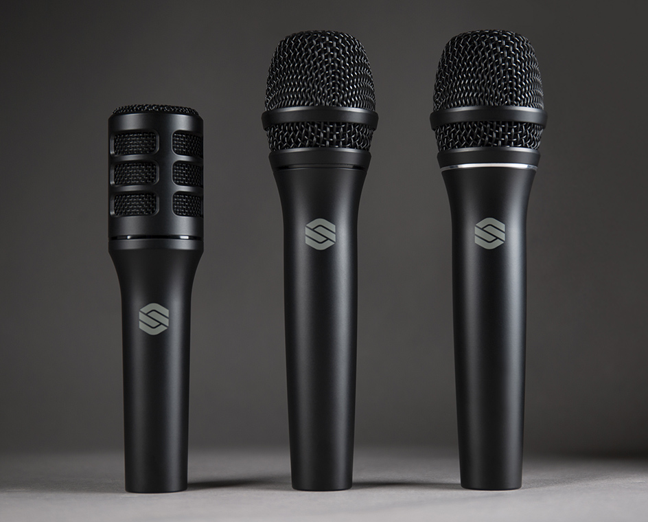 Three black Sterling microphones from the Performance Microphone range shown upright