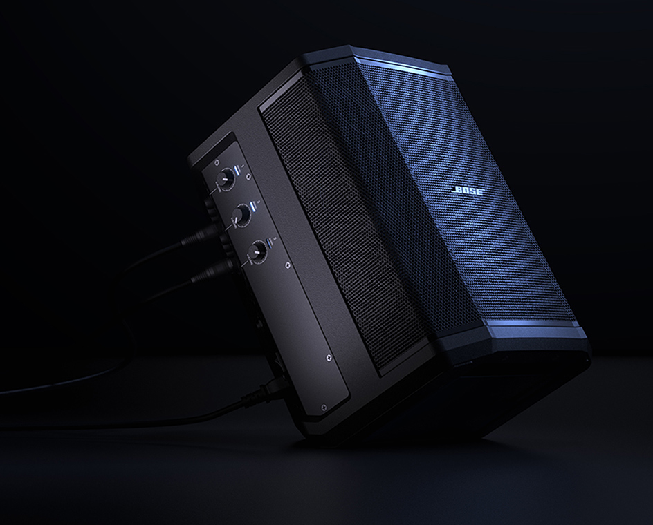 Bose S1 speaker placed on the floor in a tilted position