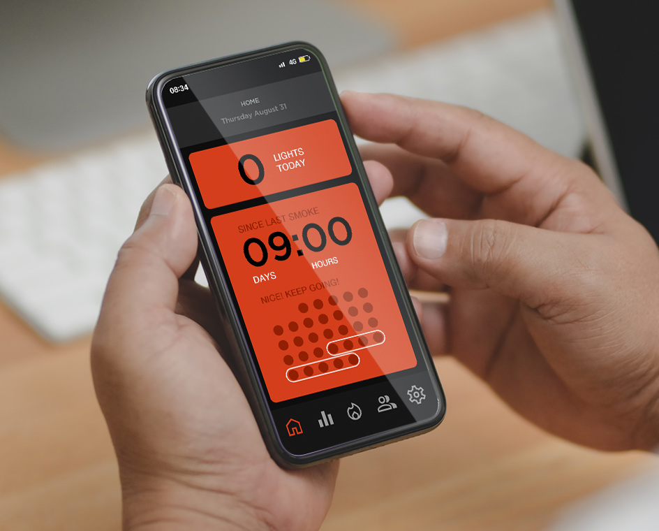 View over a person’s shoulder holding a phone displaying the Quitbit app.