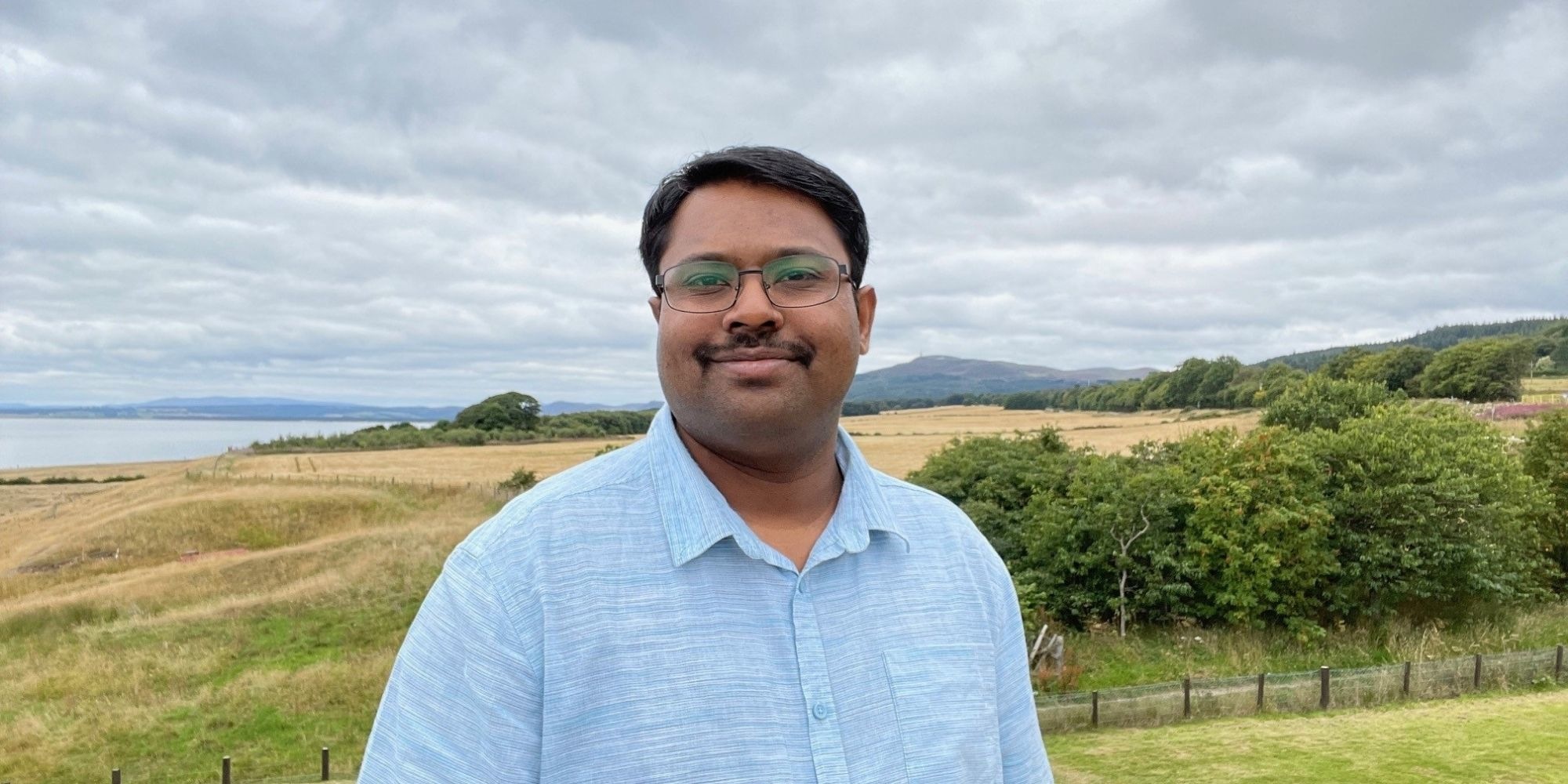 man with nature in the background