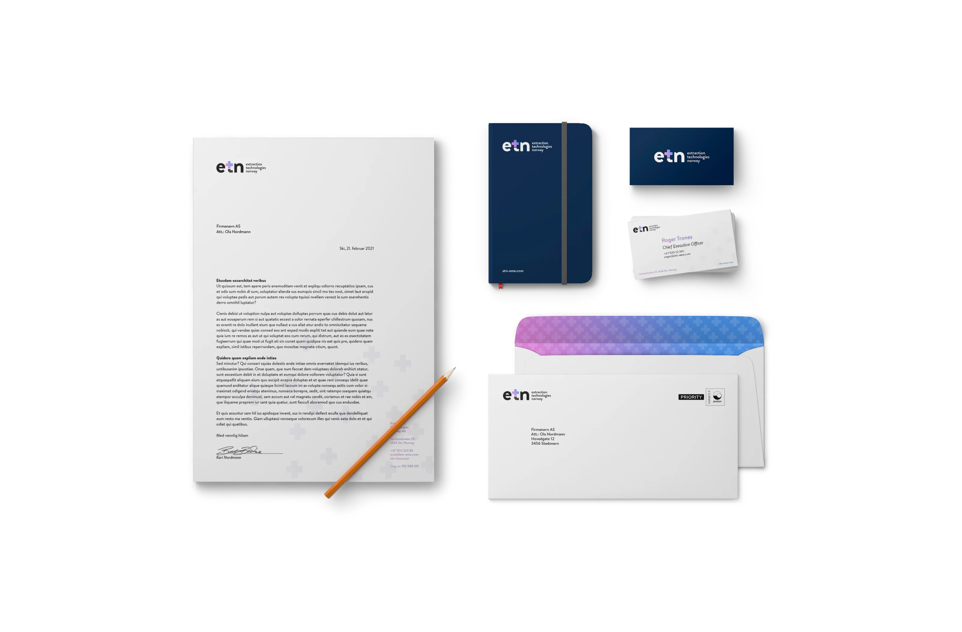 Set of branded stationery including letterhead with typed text and logo, pencil, blue notebook with elastic band, two business cards, and two envelopes with colorful inner lining and printed logo.