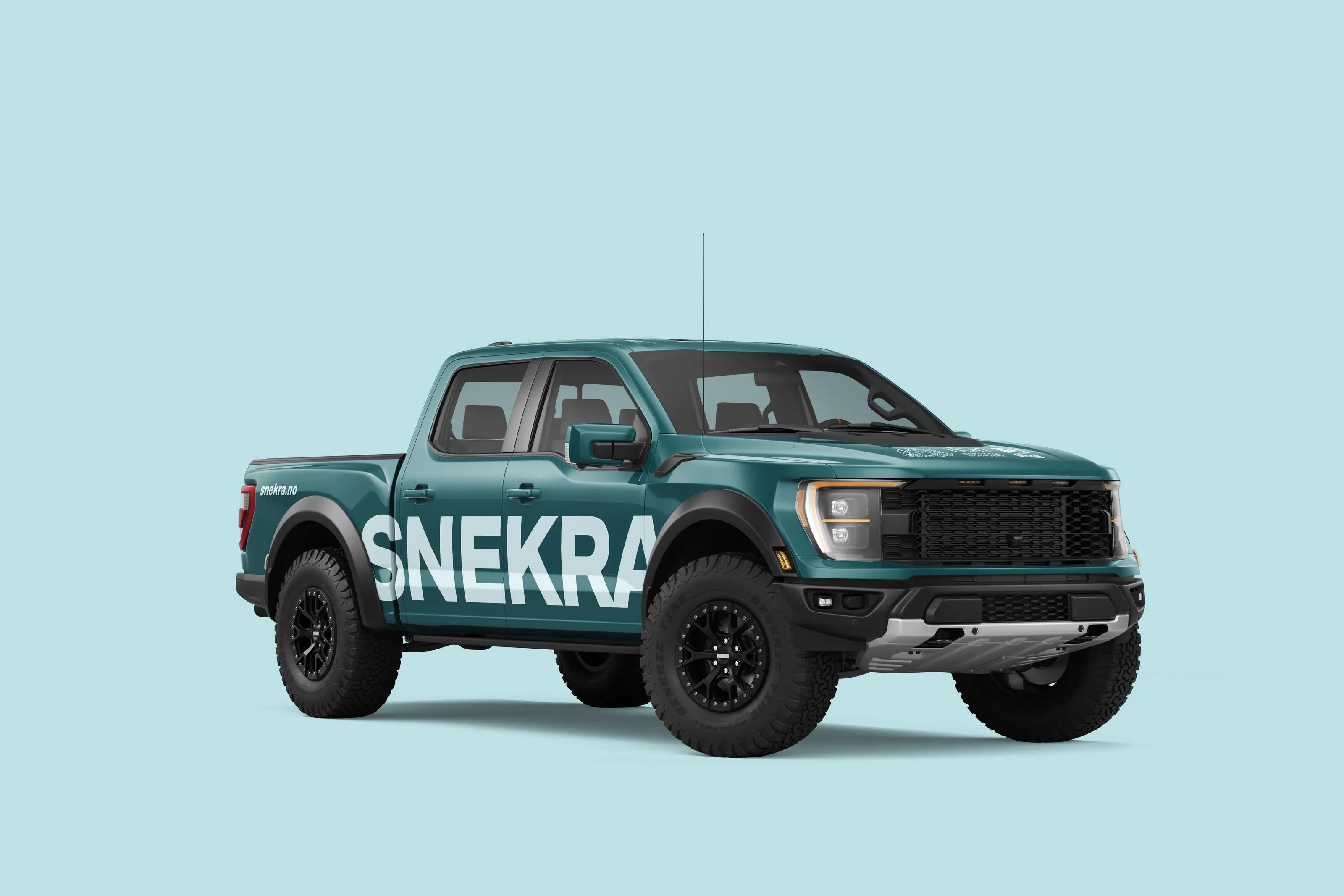Teal off-road pickup truck with bold white SNEKRA branding on the side, displayed on a light blue background.