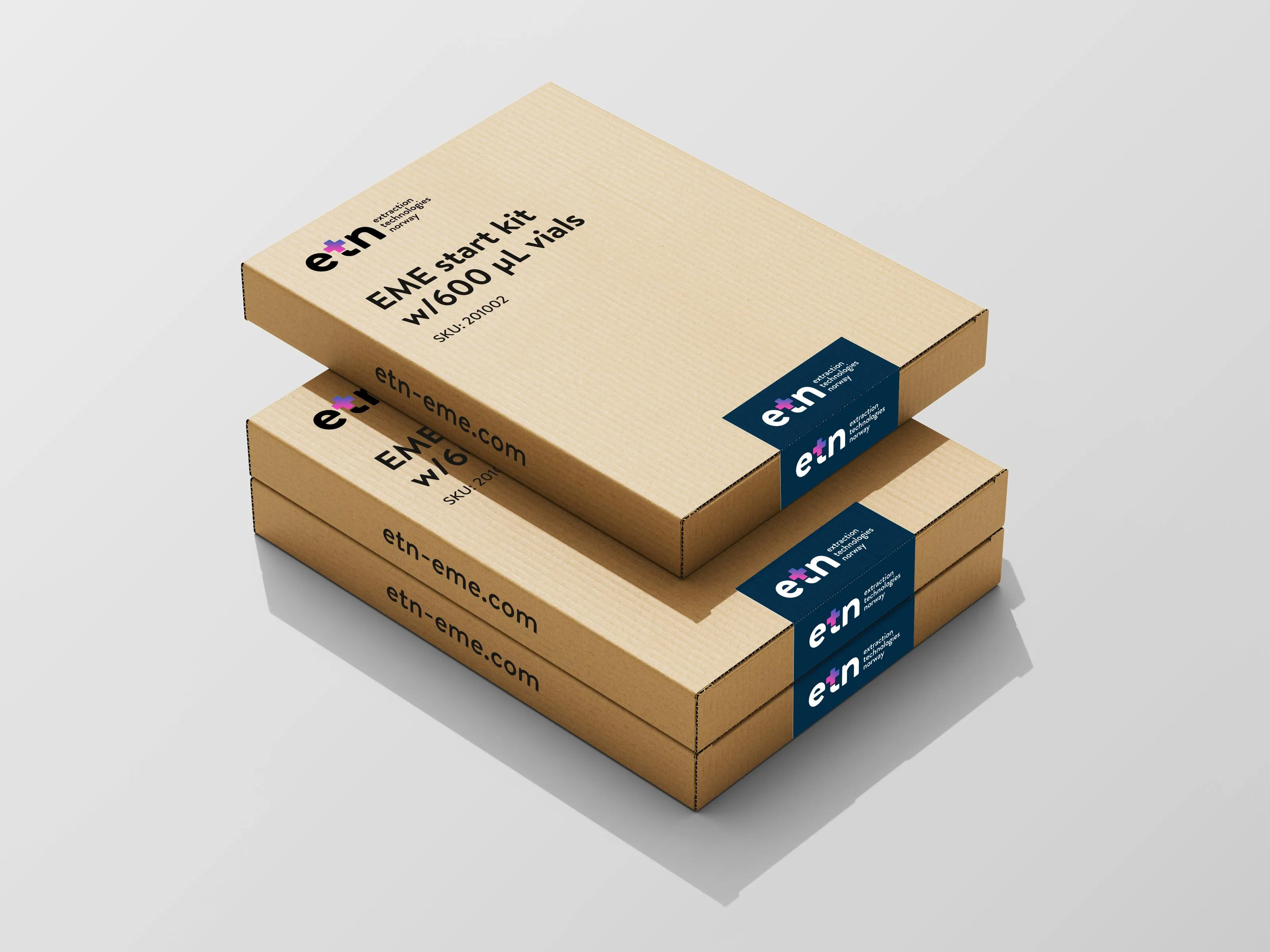 Two stacked flat cardboard boxes labeled 'EME start kit w/600 µL vials' with etn branding and website etn-eme.com.