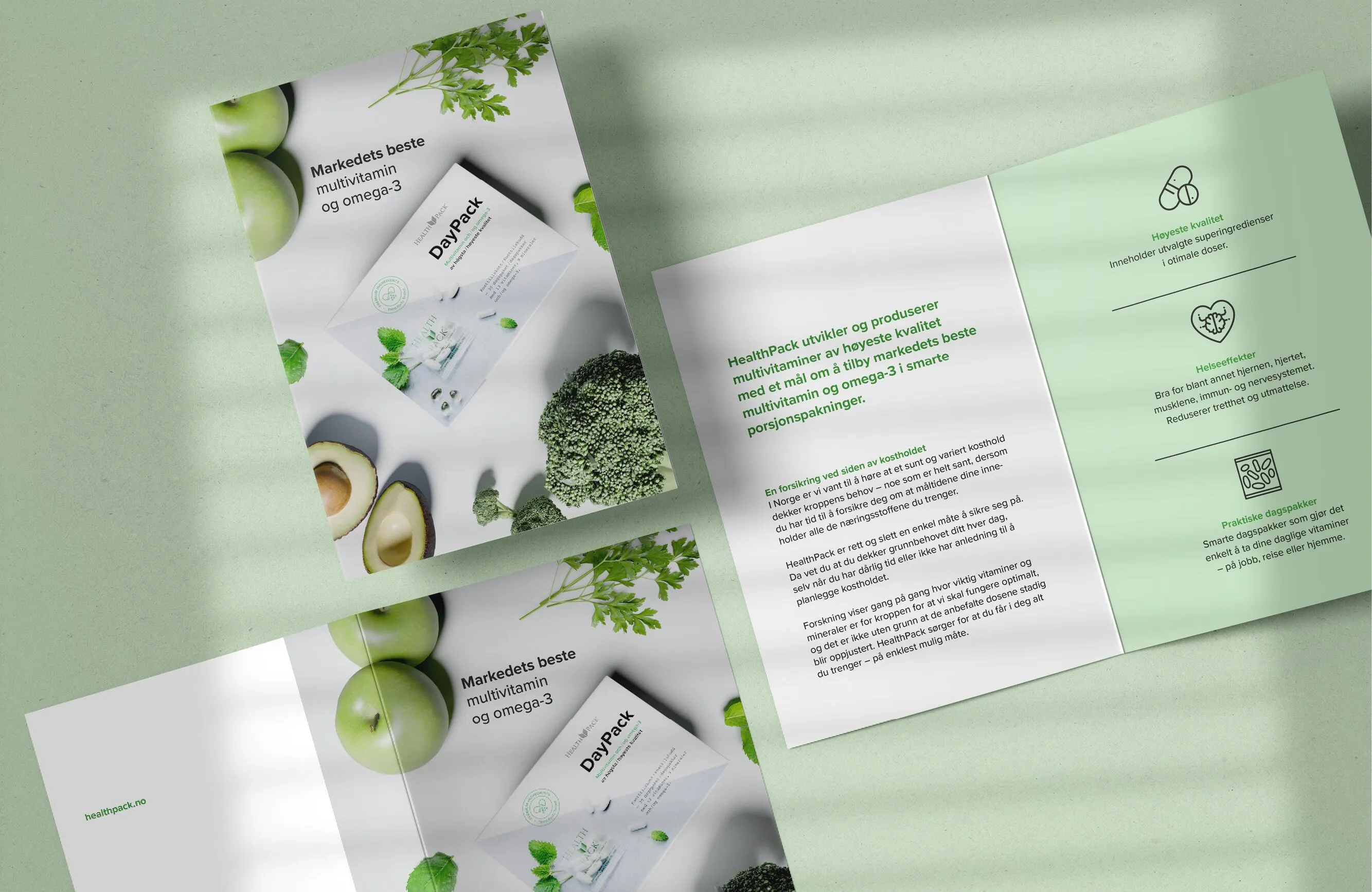 Brochure for HealthPack DayPack multivitamin with omega-3, featuring images of green apples, avocado halves, broccoli, and parsley on a light green background.