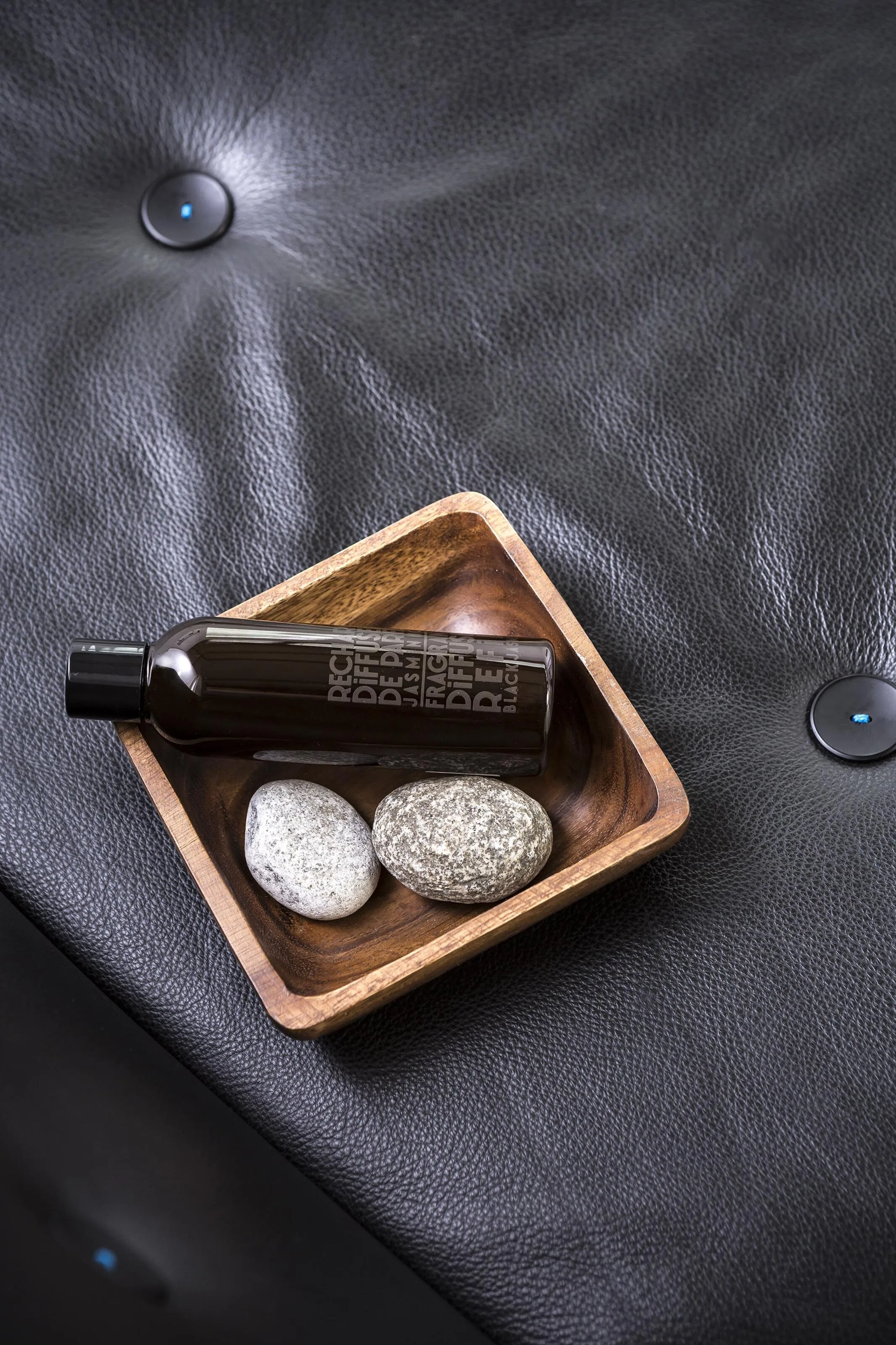 Alterna bathroom furniture product display showing multiple vanity unit variations in white, light oak, and dark wood finishes, each with white ceramic undermount basins and polished chrome mixer taps arranged to highlight design versatility.