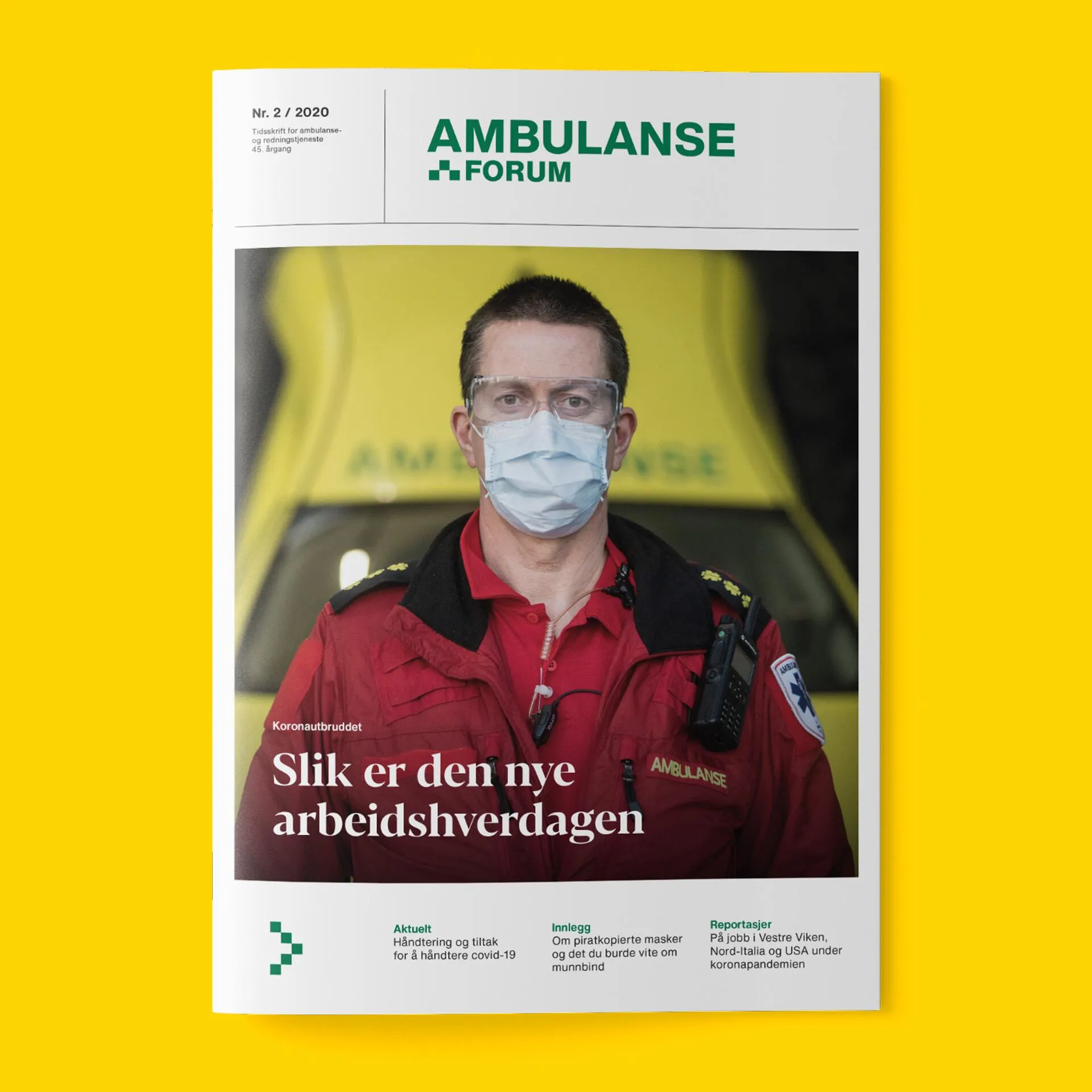 Cover of Ambulance Forum magazine featuring a masked emergency responder in red uniform standing in front of a yellow ambulance.