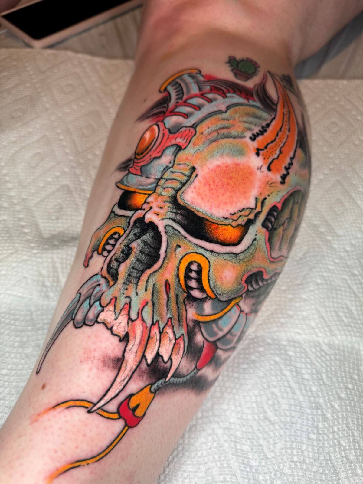 Cybernetic bio-mech skull tattoo