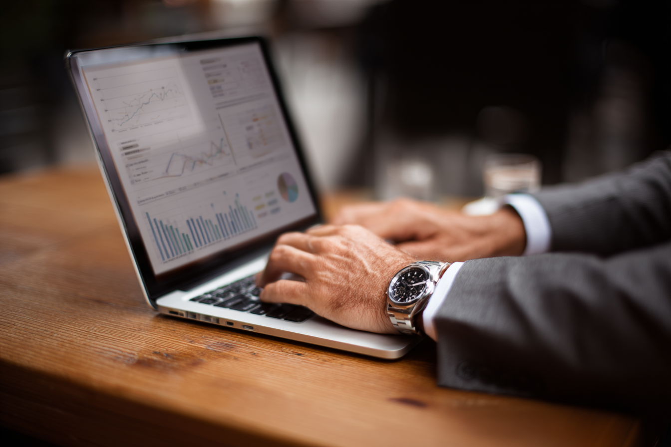 MSP owner reviewing sales talking points and pitch framework on a laptop