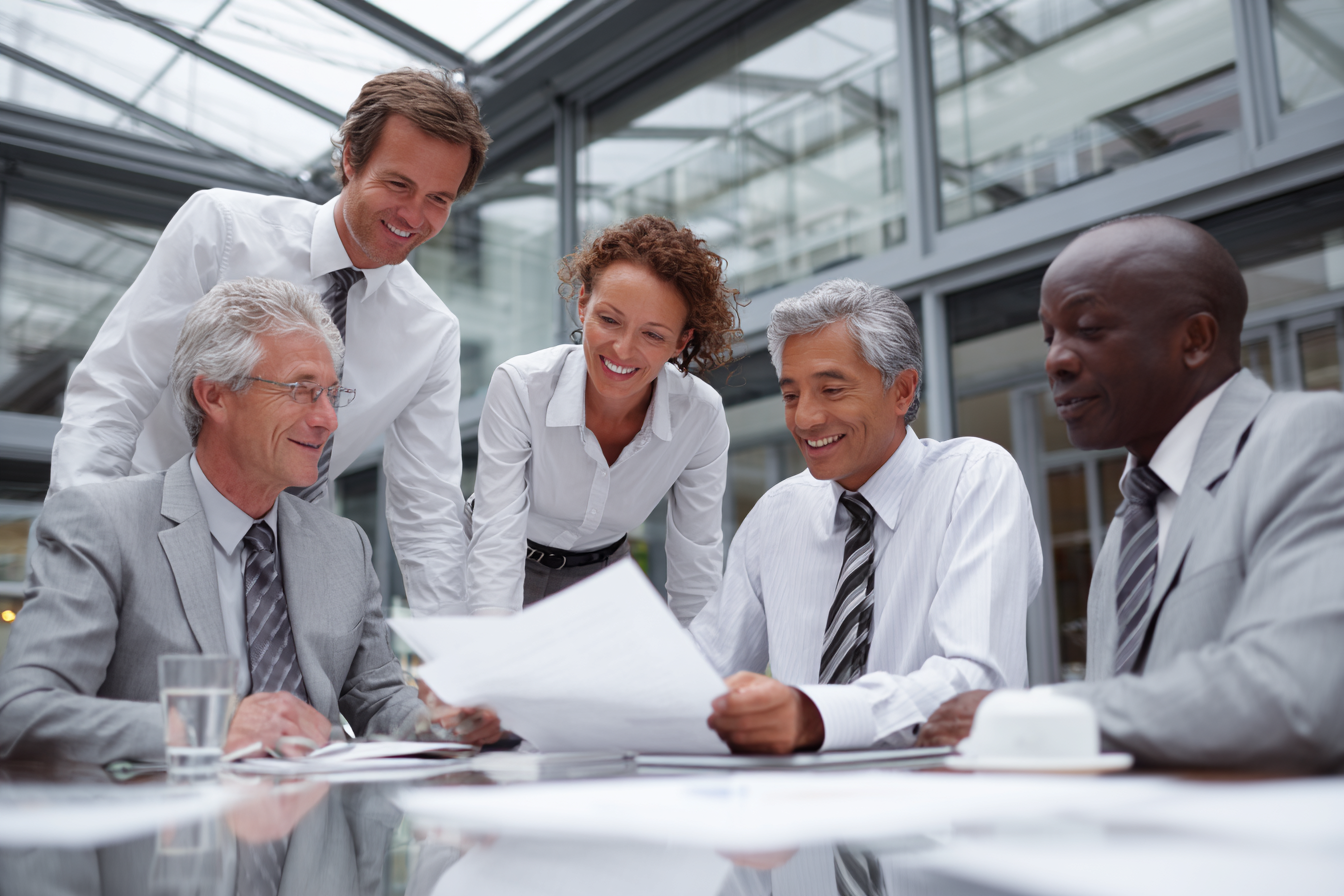 business team reviewing MSP proposals during a planning meeting