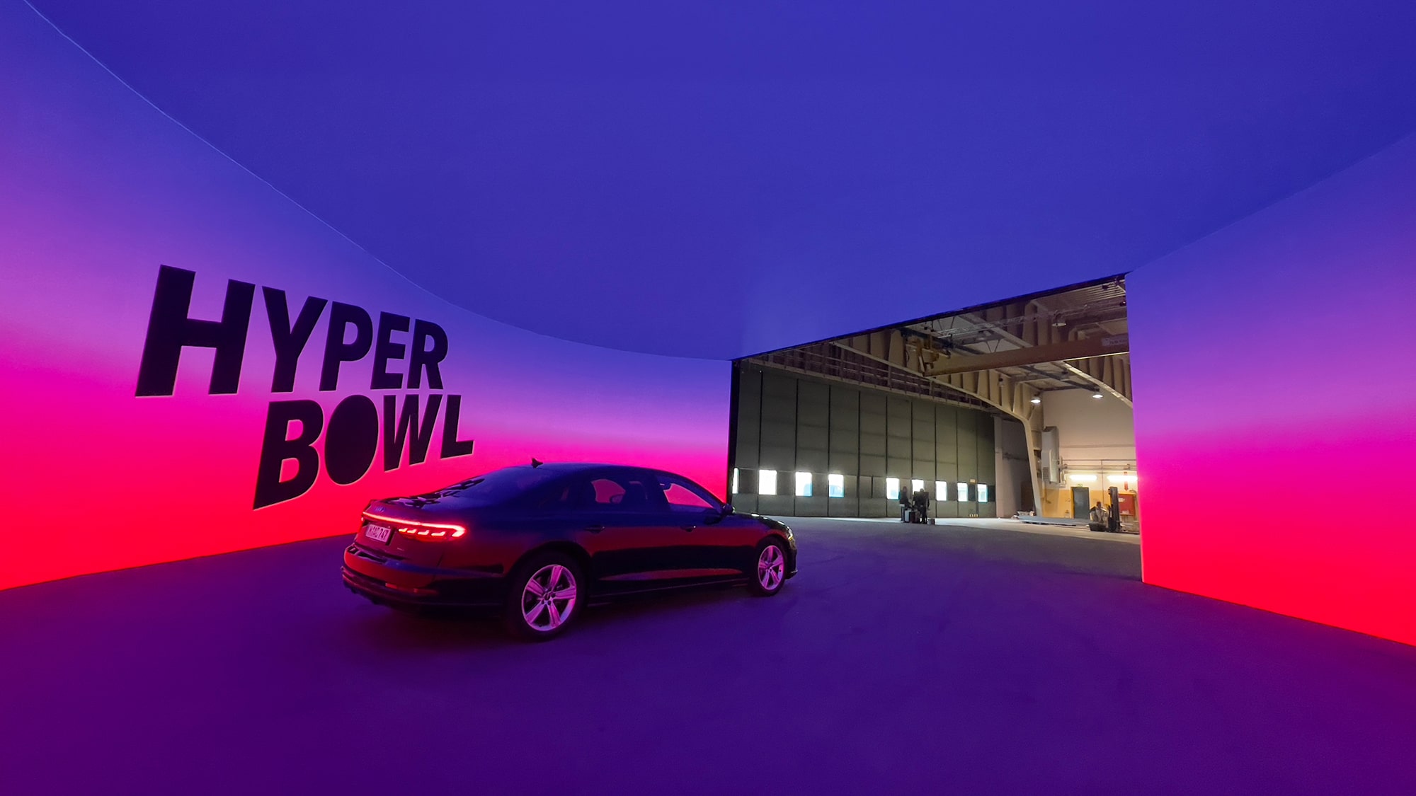 hyperbowl soundstage colorful with a car