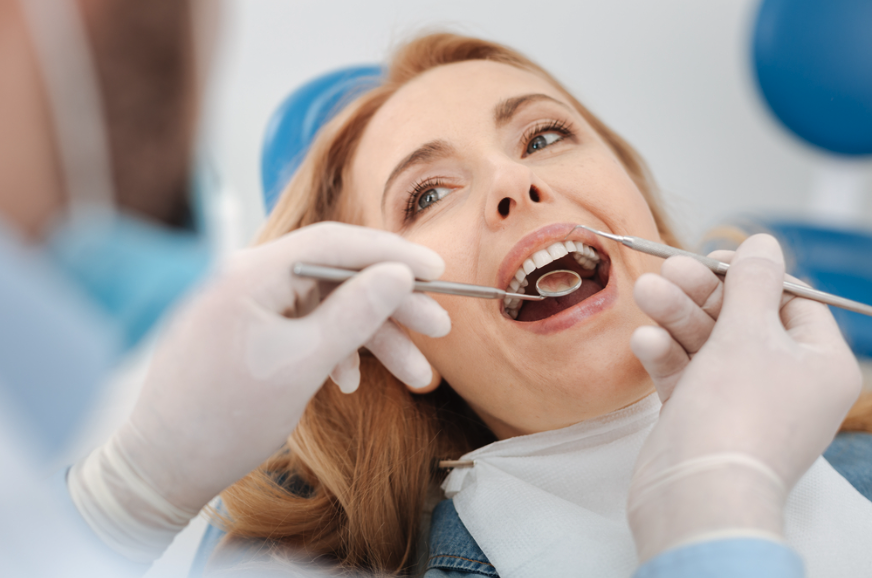 Dental Bridge Vs. Single-Tooth Implant: How Houston Patients Can Choose Confidently