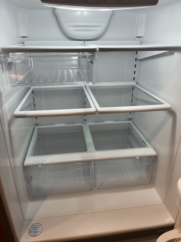 Clean and organized refrigerator after a summer kitchen refresh