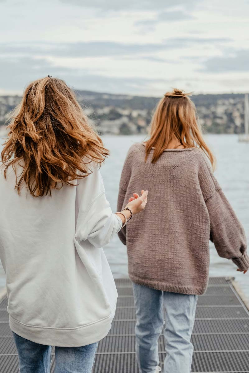 An Image of two girls running, Photo captured from the back