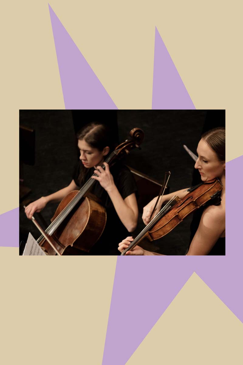 A picture of two women playing violin and cello placed on a graphic design background