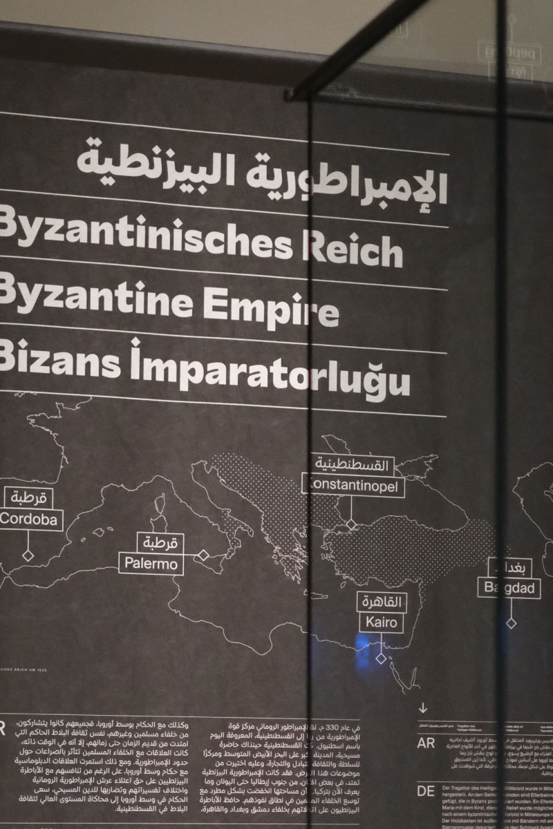 Photo of a black exhibition wall with a white european map and the headline "Byzantine Empire" written in four different languages.