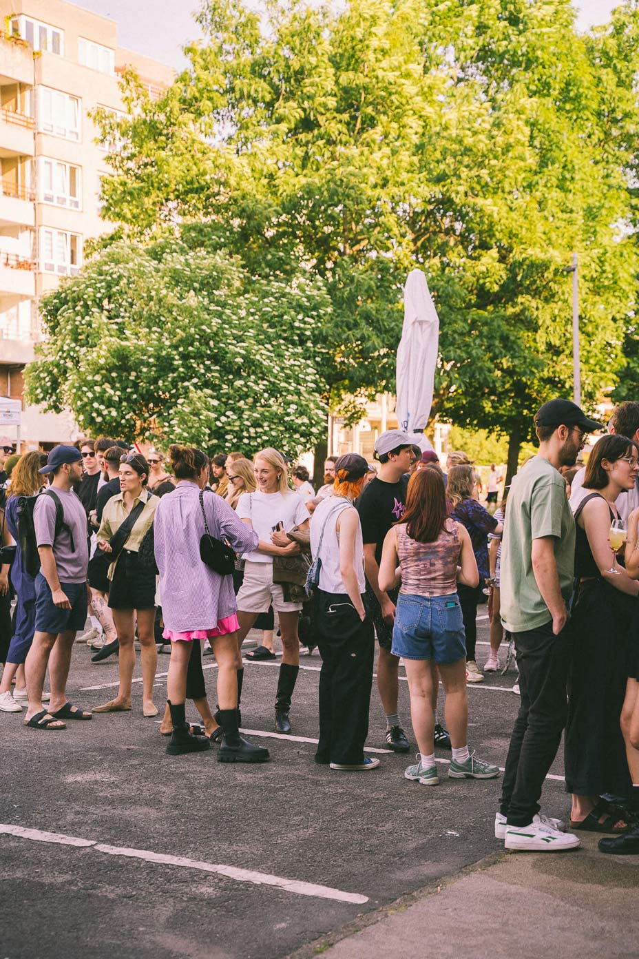 People gathering at an outdoor event, captured by a Creative Agency specializing in Event Design and Brand Experiences.