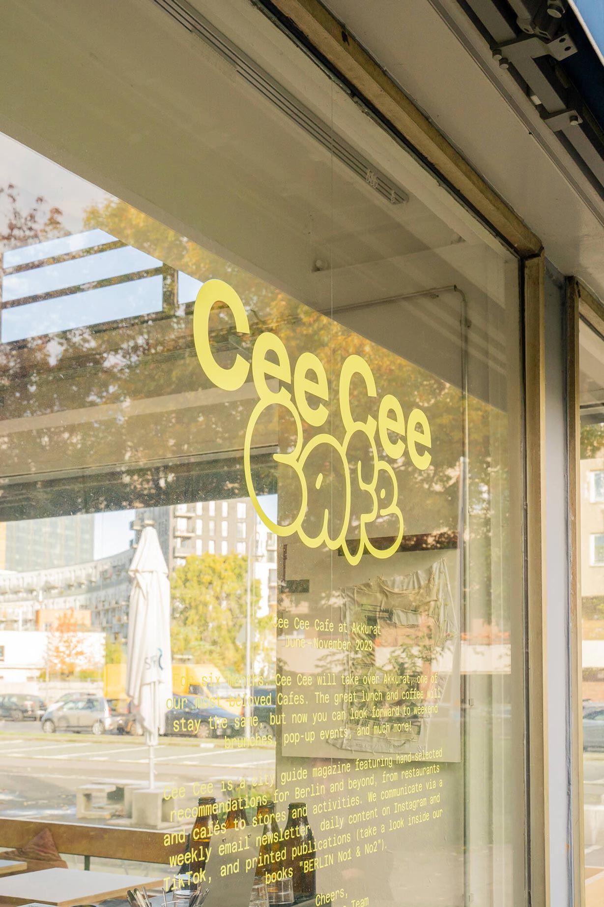 Hand holding Cee Cee Café menu, photographed for Content Creation and Social Media Content.