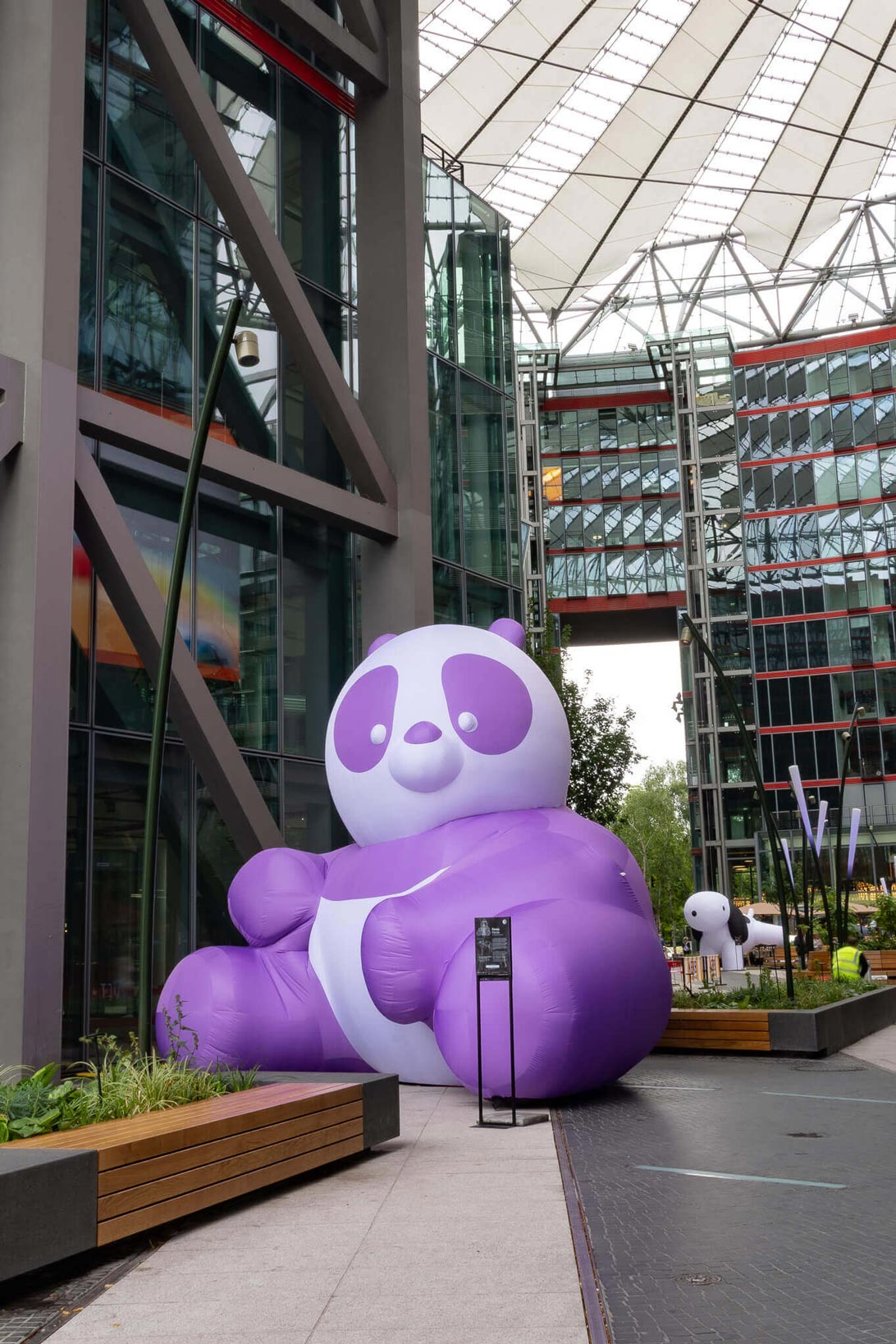 Large purple inflatable panda at Das Center am Potsdamer Platz Berlin, created as part of an Event Design and Brand Experience by a Creative Agency.