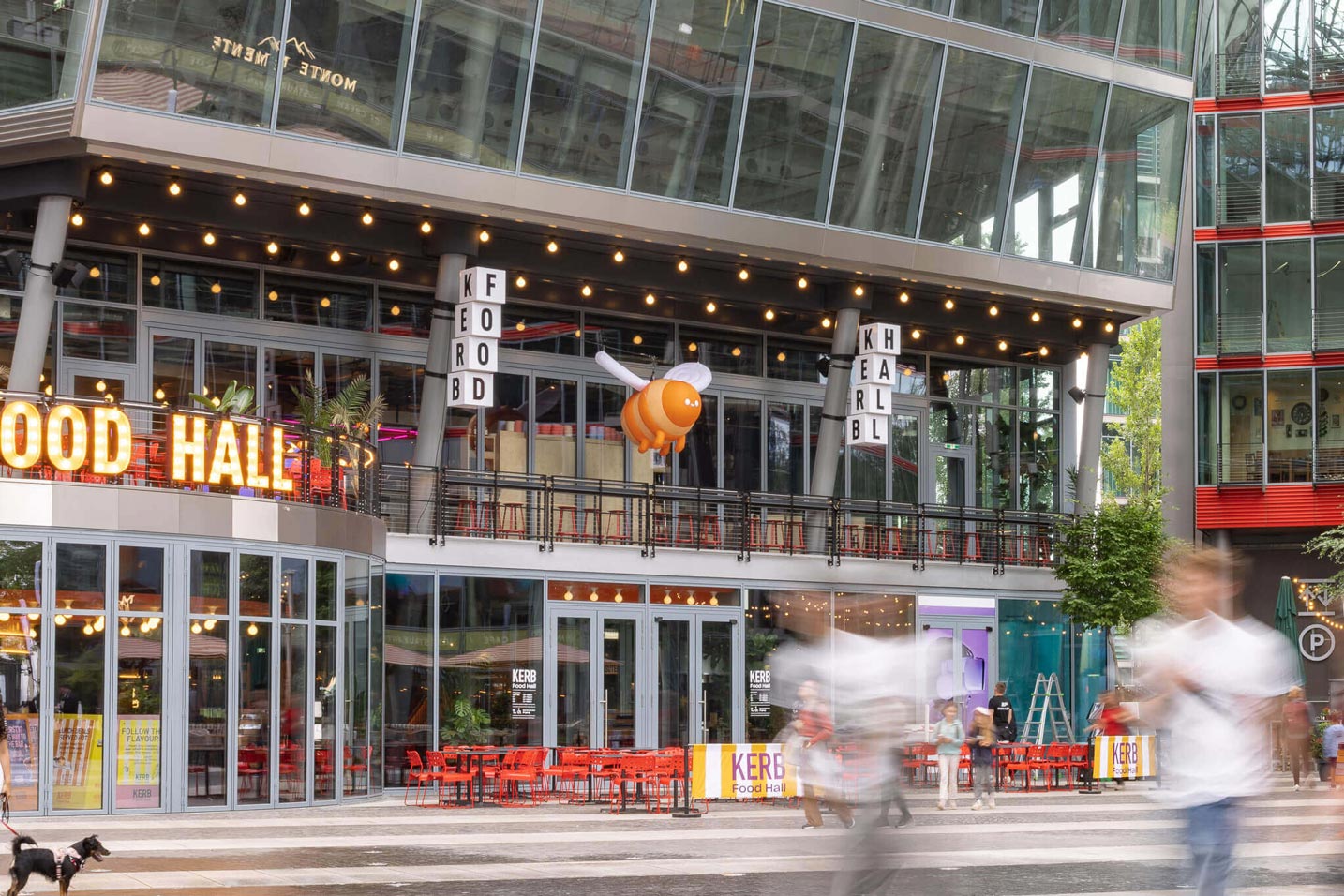 Inflatable bee hanging above the KERB food hall, designed by a Creative Agency for a Brand Experience.