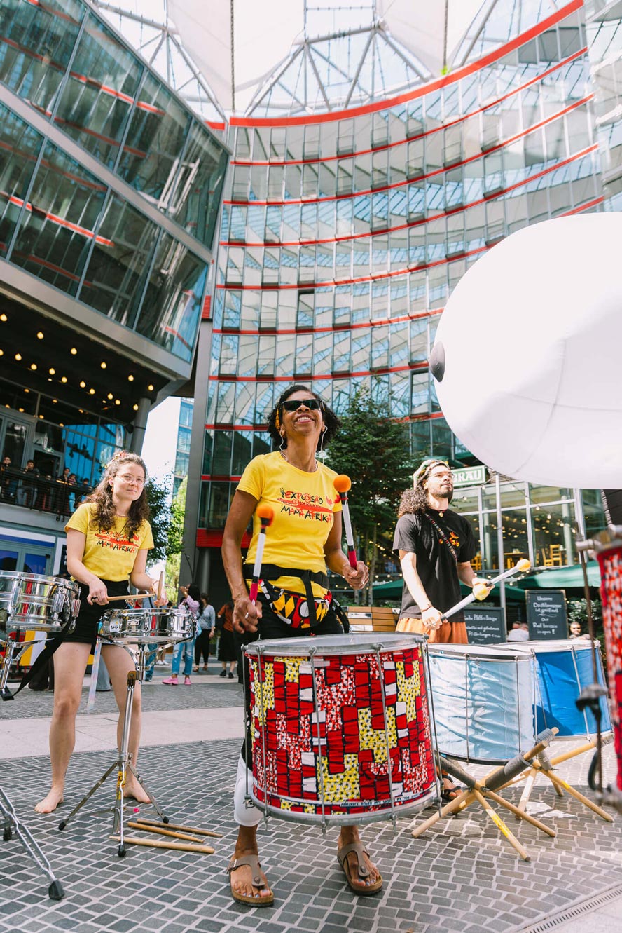 Drumming group performing at Das Center am Potsdamer Platz, captured for Creative Agency Event Design and Live Brand Experiences.
