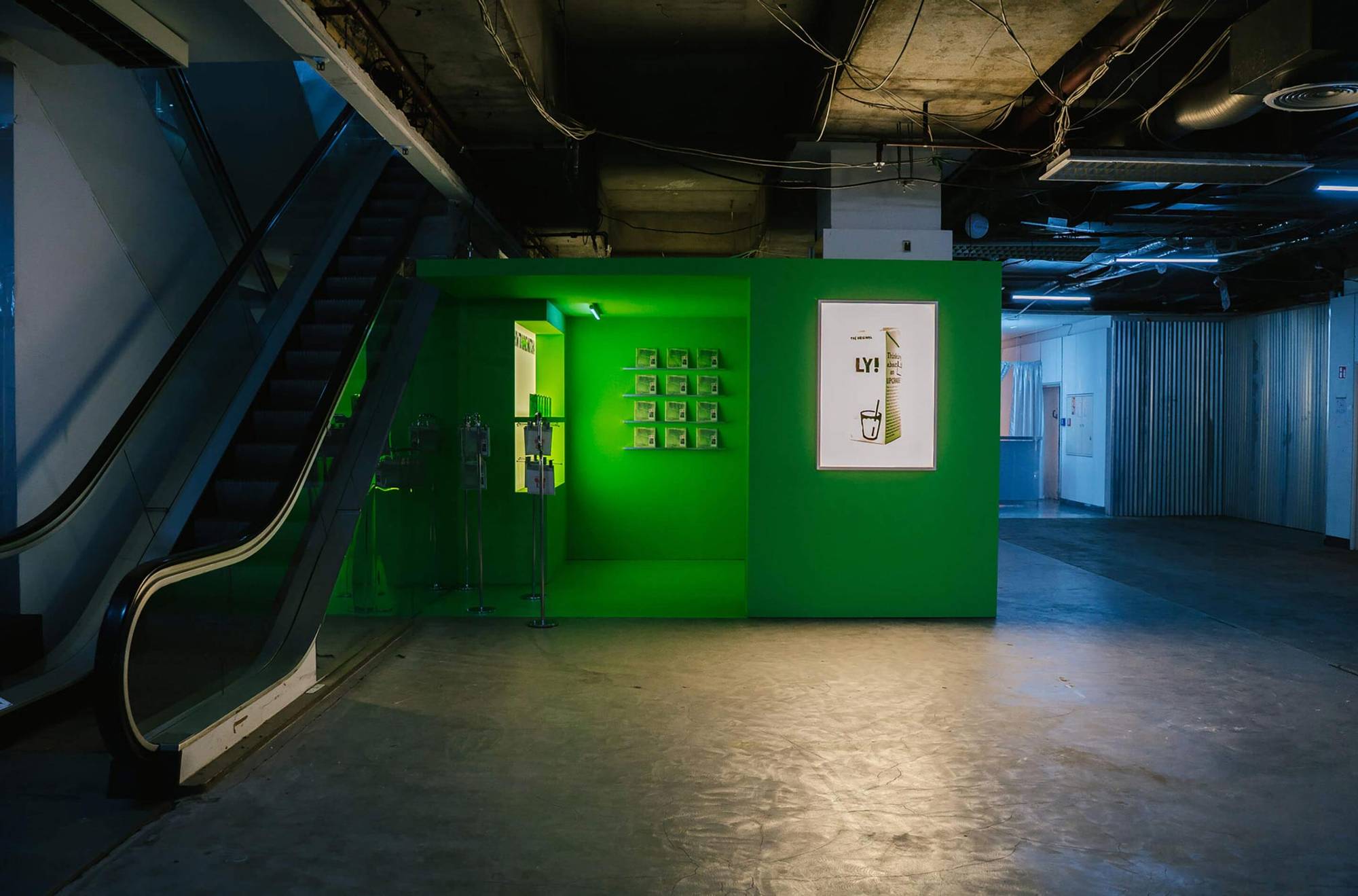 A neon-green installation corner featuring Oatly Matcha products and signage, created by a creative agency and marketing agency in Berlin.