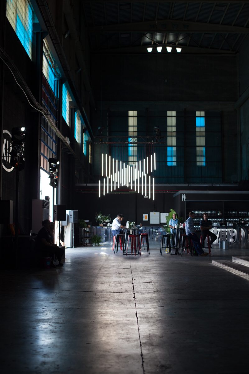 An image of the KIA launch event design, showing a neon lights installation.