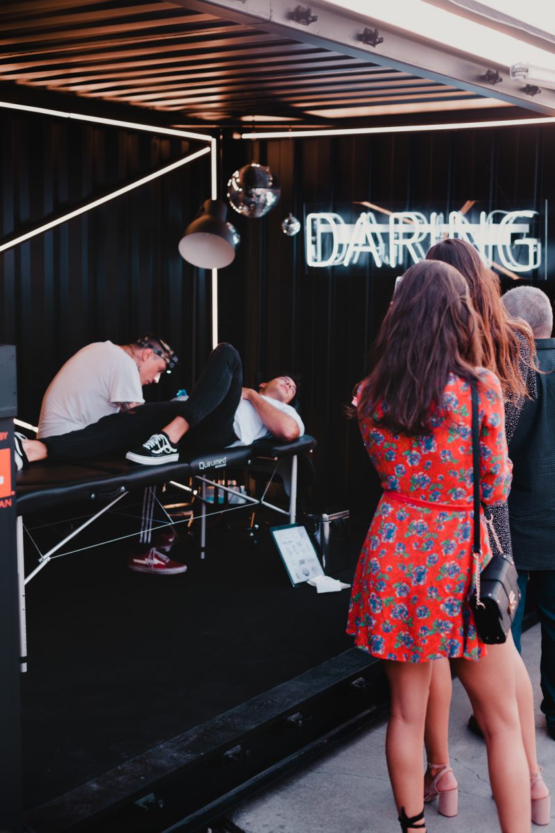A photograph of the tatoo station as part of the experience program, at the KIA launch event.