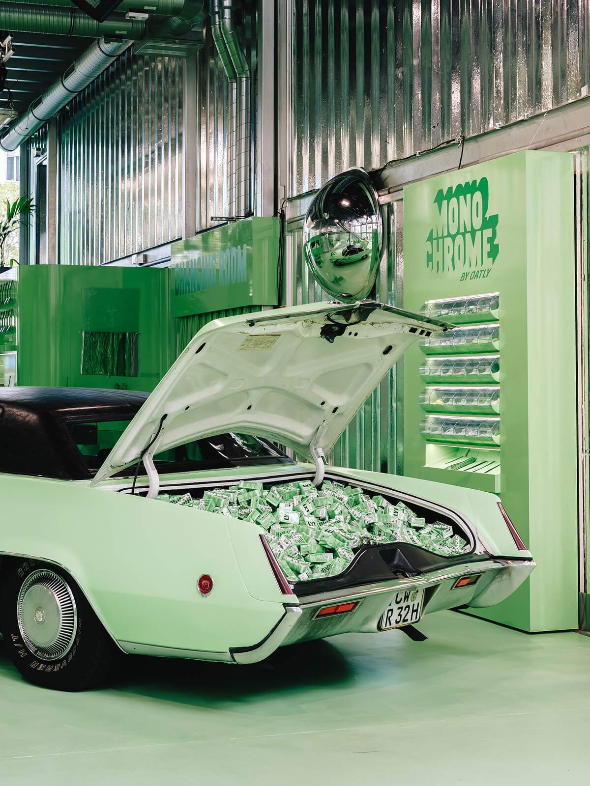 Car trunk filled with Oatly packaging at the pop-up store – content creation for brand activation