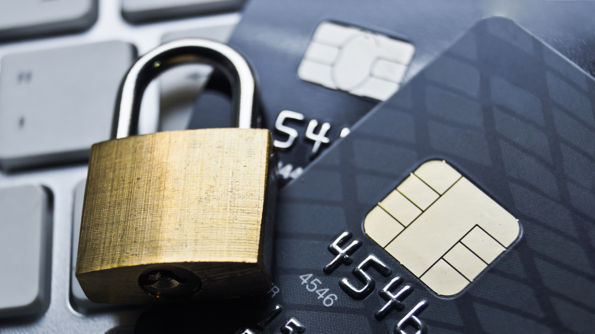 Credit cards and a lock symbolizing safety and security features for ASAPP CXP.