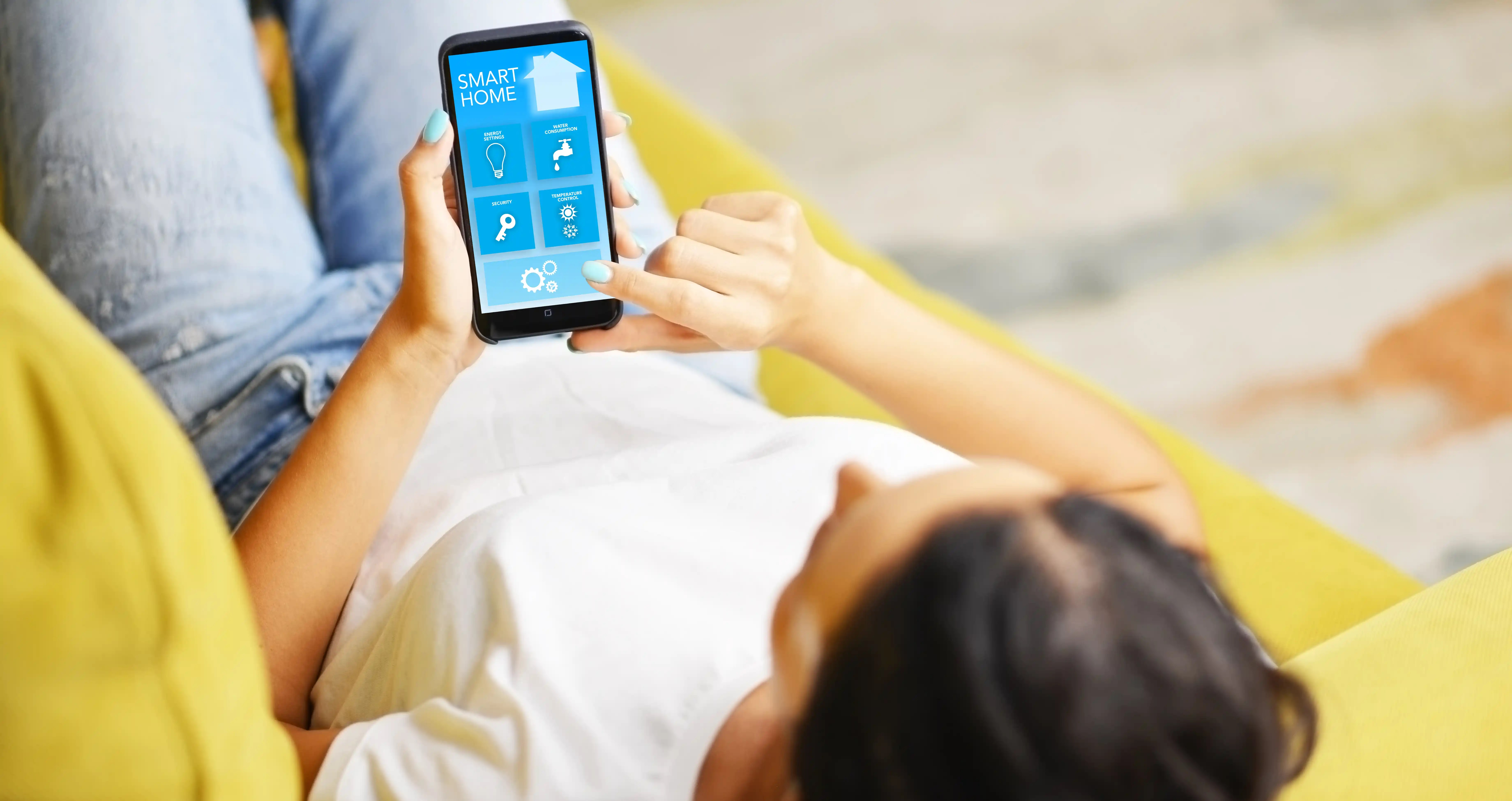 Person controlling a home security system from a smartphone