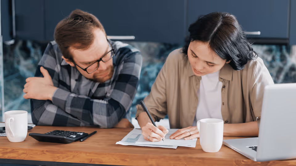 Parents engaged in analyzing documents as part of Coral Care's initial evaluation process