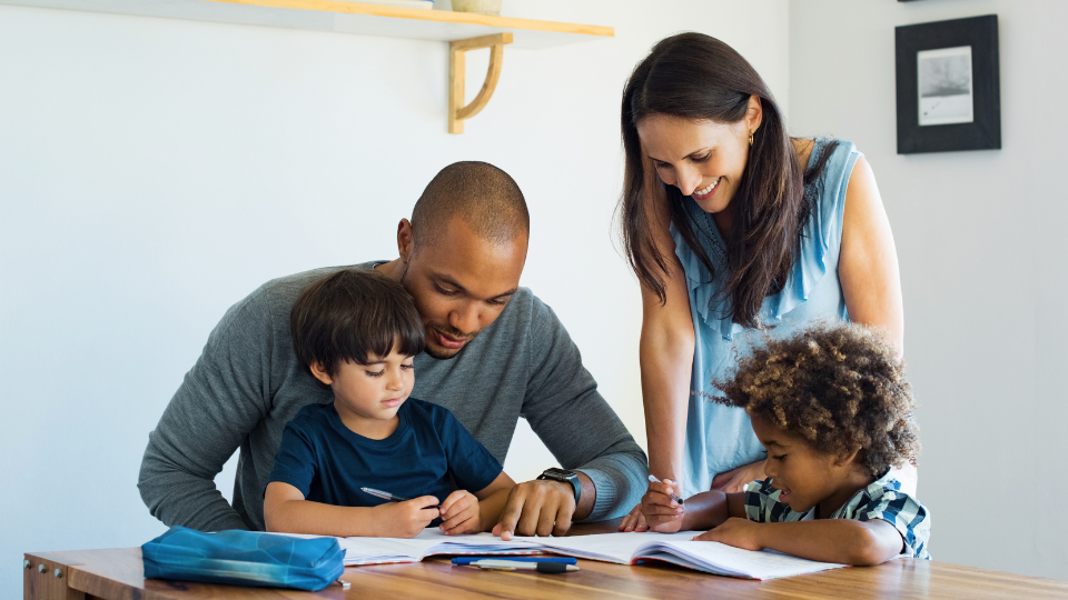A family works together on homework, emphasizing available resources for parents near Houston, TX