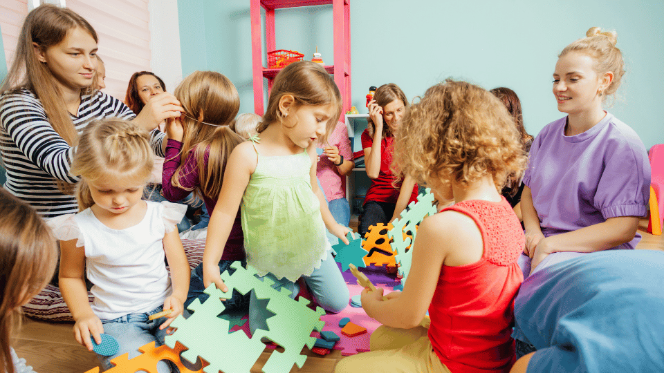 Children playing with toys in a classroom, showcasing a vibrant learning environment for parents in Houston, TX.