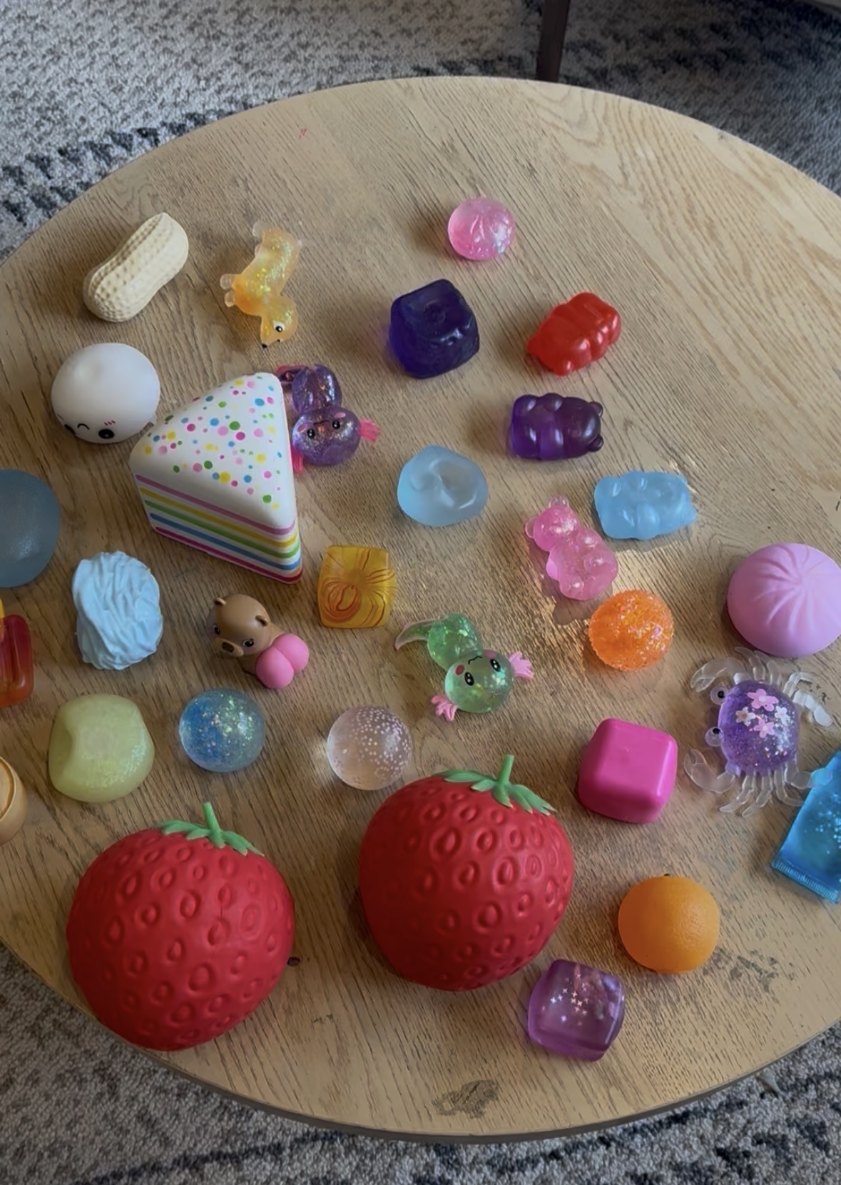 table covered with assorted squishy toys