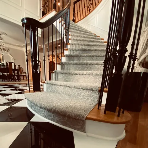 Luxury tile and stair runner in a Greenville Home
