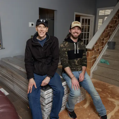 All About Flooring's expert installation team in a customer home