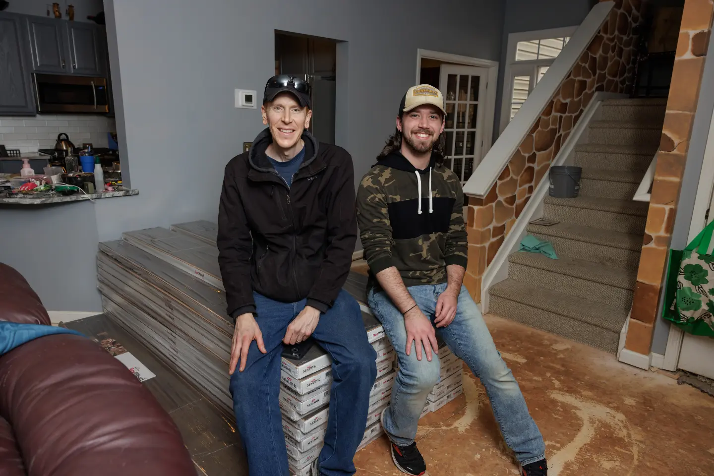 All About Flooring's expert installation team in a customer home