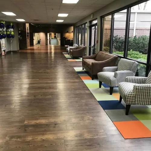 grey luxury vinyl plank installed in a Church lobby