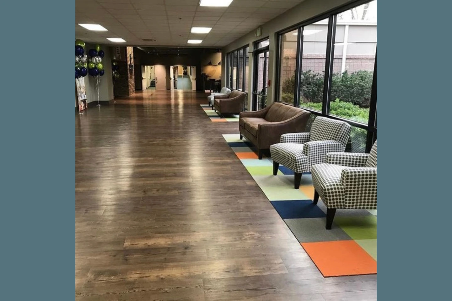 grey luxury vinyl plank installed in a Church lobby