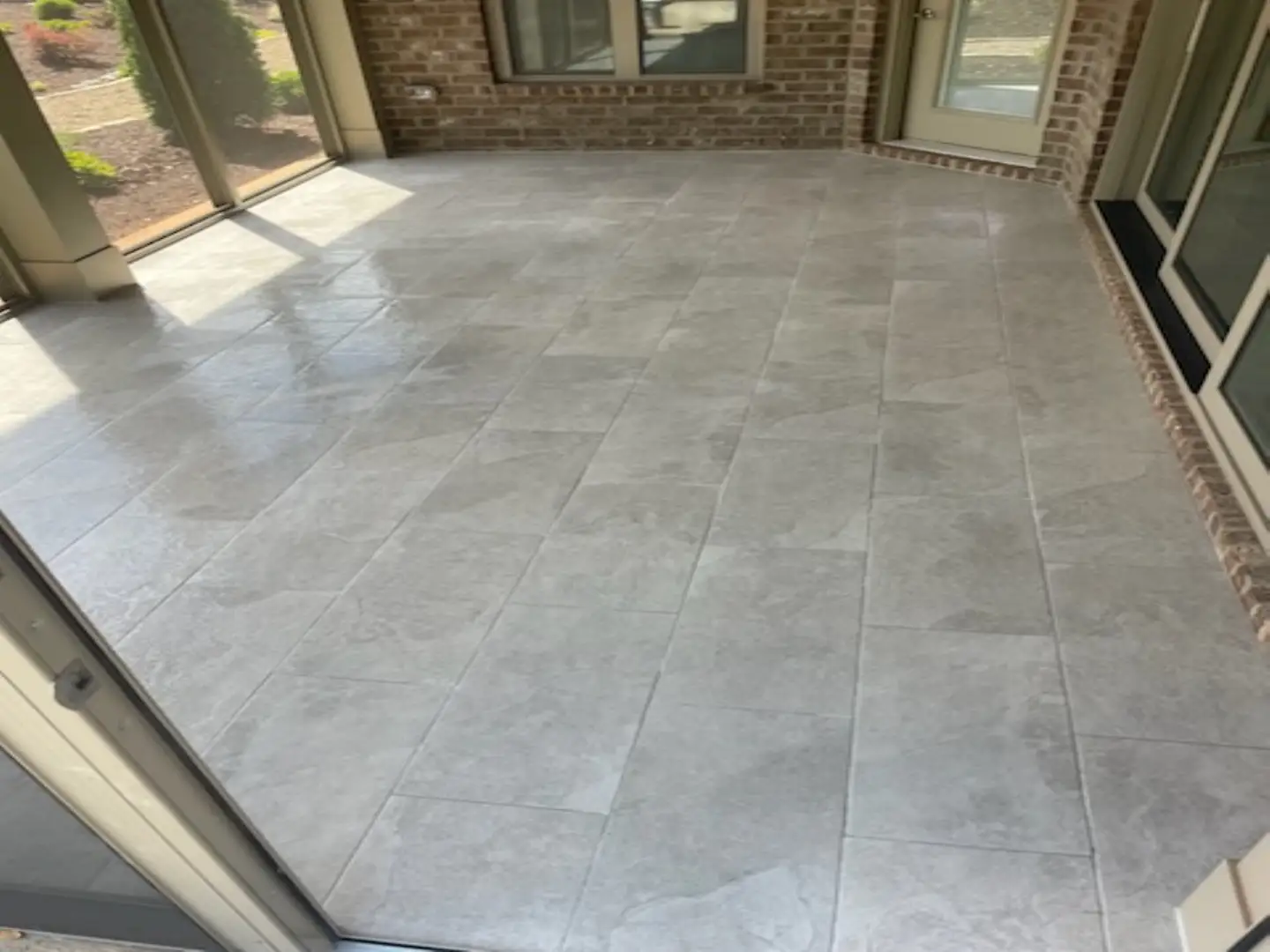 Shaw grey ceramic tile in sunroom