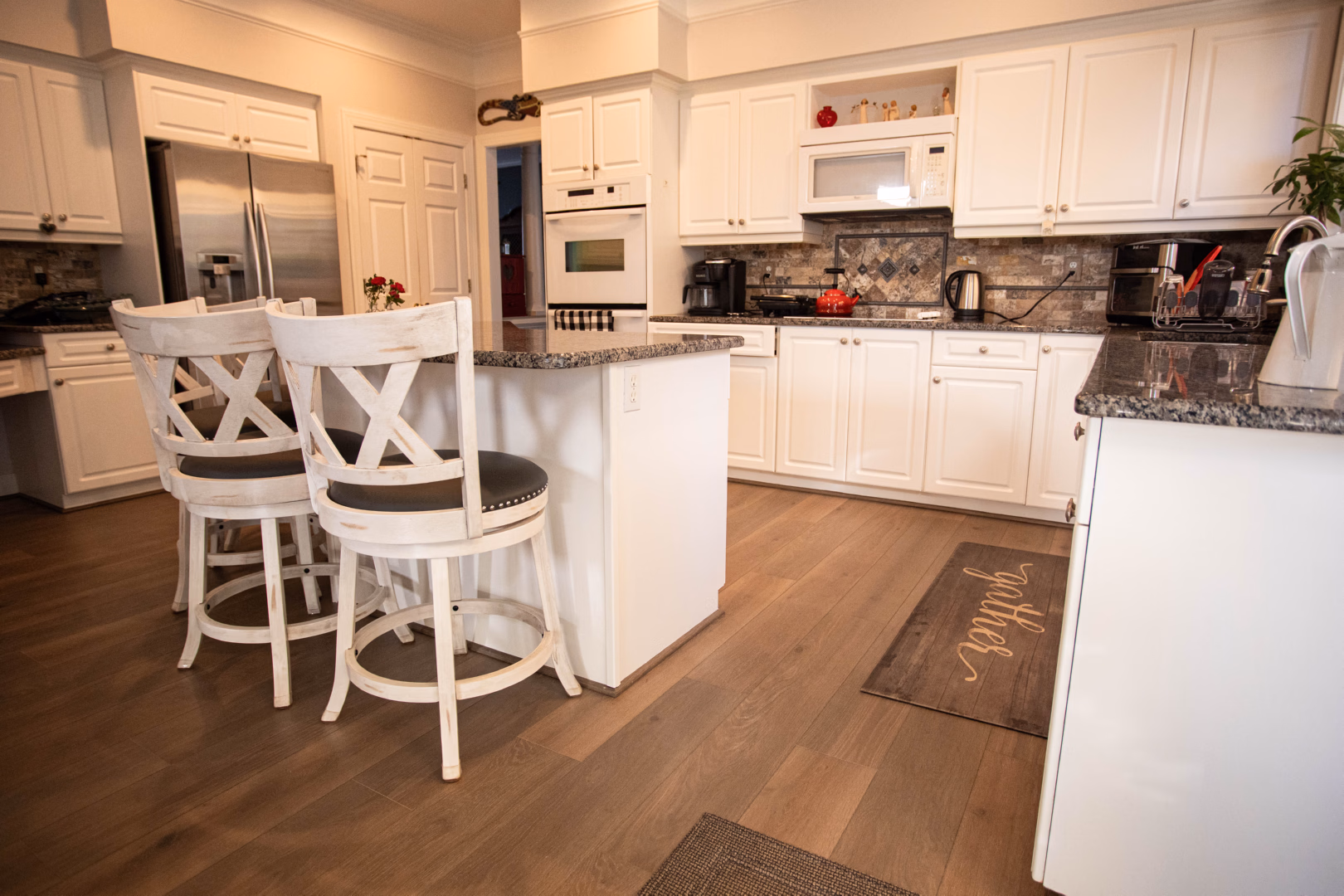 laminate flooring installed in a kitchen and dining room area in Greenville