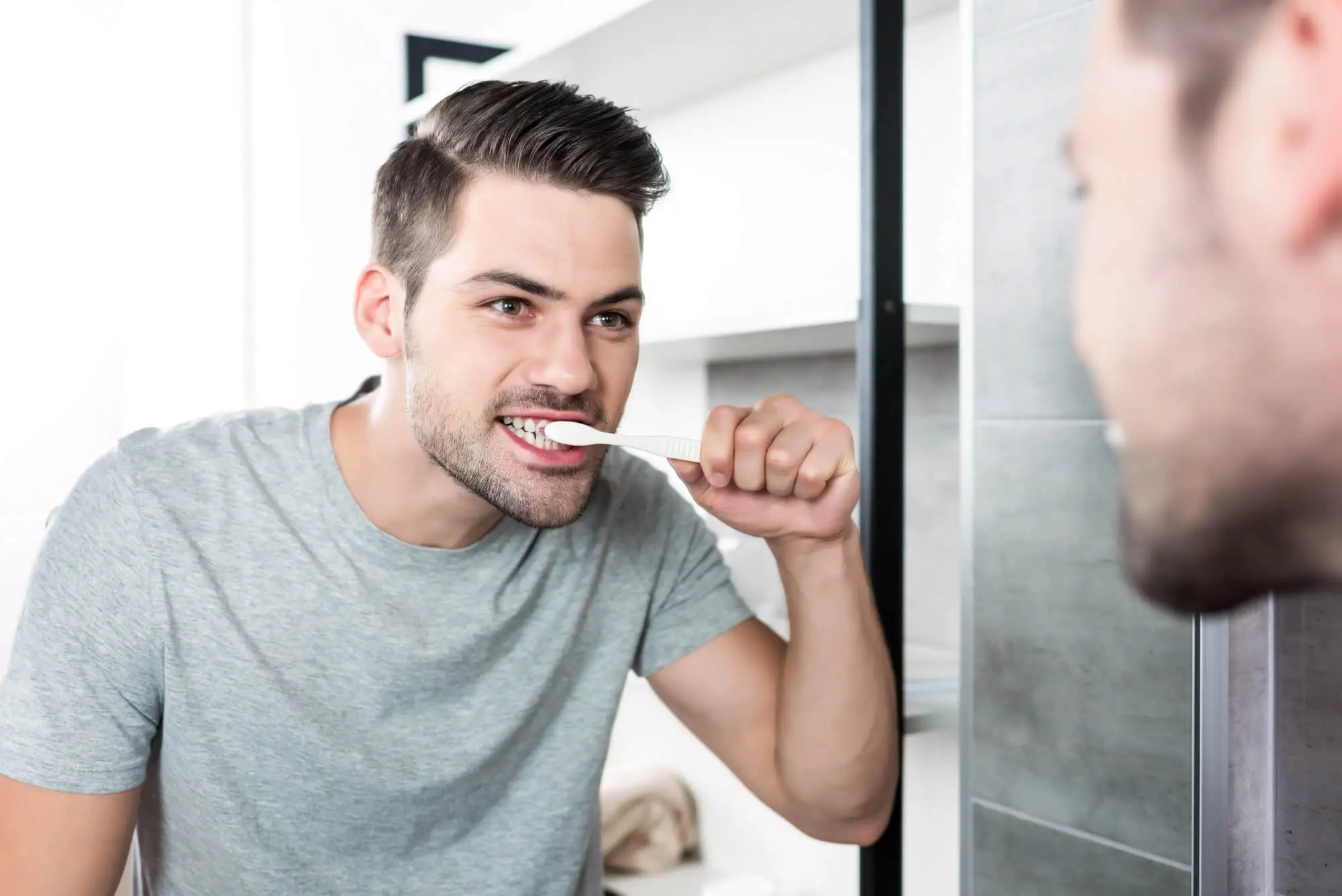 Man with good Oral Hygiene Protecting Their Dental Crowns in Central Alabama